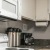 a kitchen with white cabinets